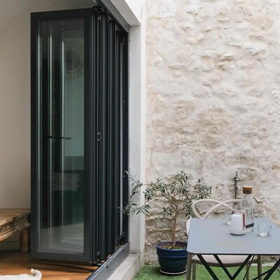Guter Preis YATTON Hochwertige kundenspezifische Thermal Break Klapptüren Doppelschicht Isoliertes Gehärtetes Glas Modernes Design 5-Jahresgarantie Online